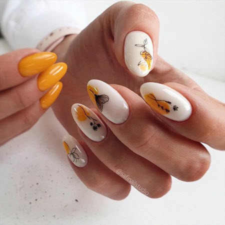 Photo de nouveaux modèles d'ongles sur des ongles ovales