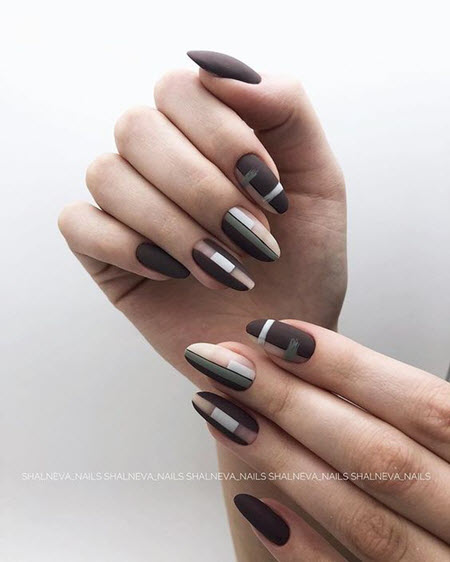 Photo de nouveaux modèles d'ongles sur des ongles ovales
