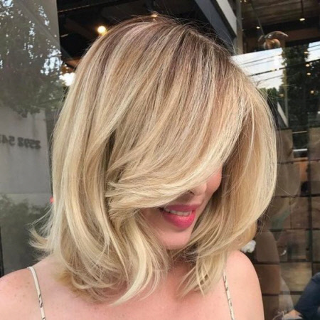 Coupes de cheveux multicouches élégantes pour cheveux moyens